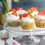 Strawberries and Cream Cupcakes on a glass pedestal