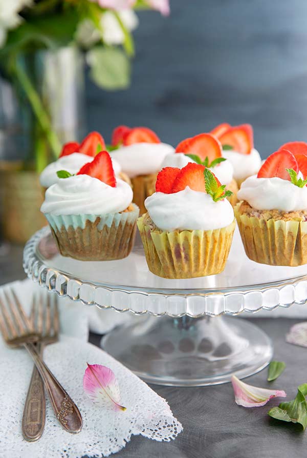 Strawberries and Cream Cupcakes on a glass pedestal