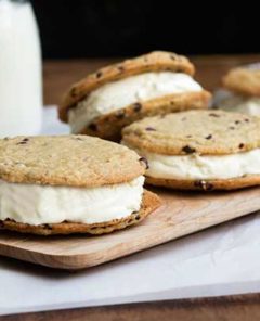 A thin, crispy gluten free chocolate chip cookie with vanilla ice cream sandwiched between.