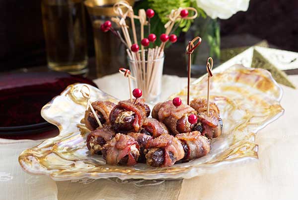 A lovely gluten free recipe for dates stuffed with goat cheese and pecans and wrapped with bacon
