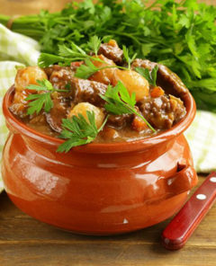 21728662   beef stew with vegetables and herbs in a clay pot   comfort food