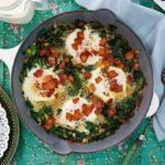 Top view of Spicy Kale and Eggs Recipe in a skillet