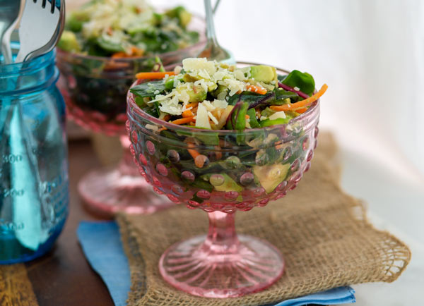 Kale & Apple Salad in a pink glass dish