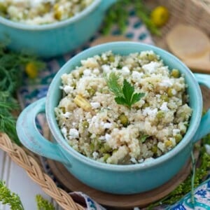Spring Quinoa with Peas and Asparagus in a blue bowl.