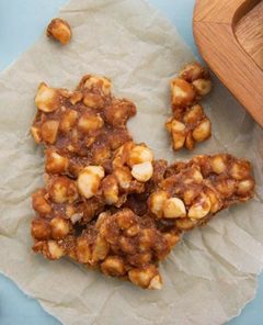 Keto Macadamia Nut Brittle on parchment paper