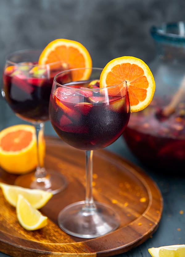 Classic Sangria in wine glasses with orange slices on the rim