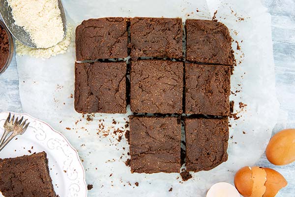 Top view of sliced 3-Ingredient Brownies on parchment paper