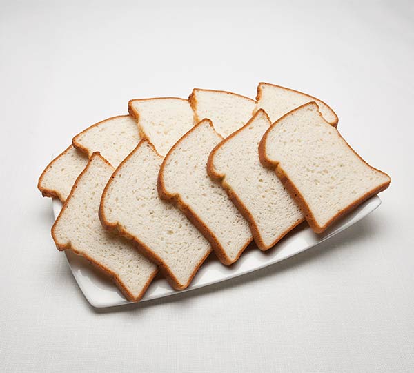 Goodman Gluten-Free Bread on a white plate with a white background