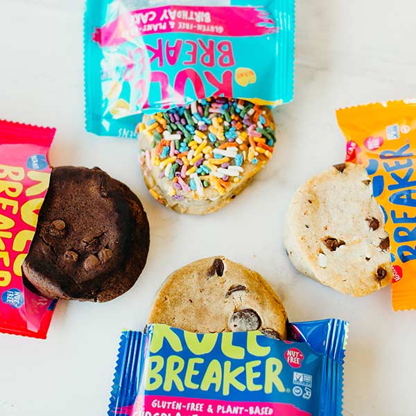 Variety of Rule Breaker Brownies halfway out of their packages
