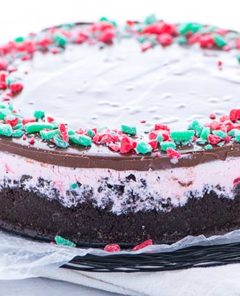 Closeup of Peppermint Ice Cream Pie on a piece of parchment paper on a black wire serving tray