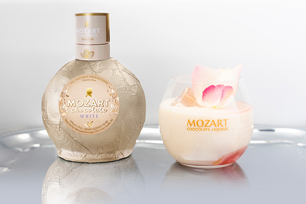 Mozart White Chocolate Liqueur on a silver background