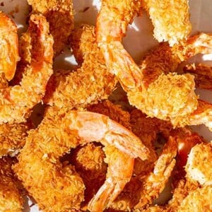 Closeup of Spicy Coconut Shrimp on a white background