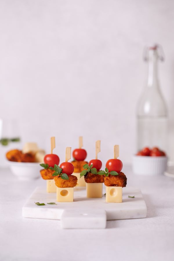 The chicken nugget skewers on a servong tray