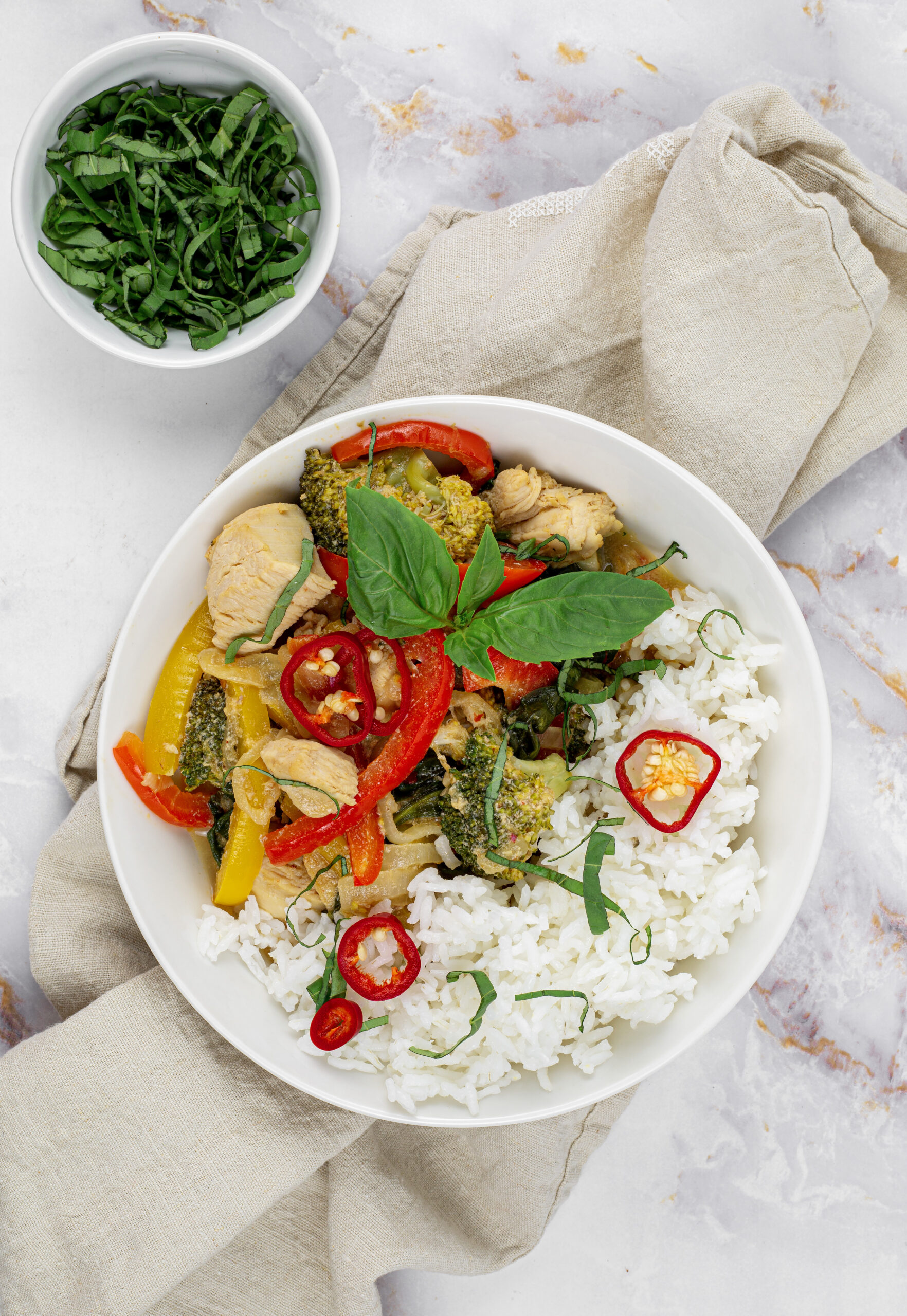 Chicken Thai red curry in a white bowl