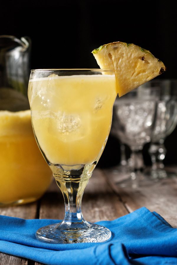 A glass of pineapple margarita