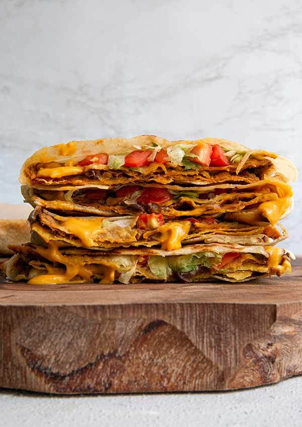 The Pant Based Crunch Wrap stacked and cut in half. 